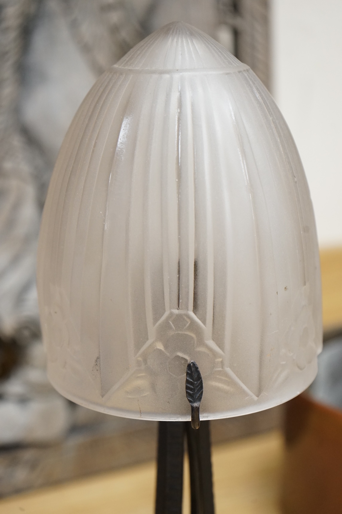 A French Art deco wrought Iron table lamp with mushroom glass shade, 34cm high